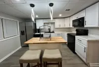 Private Urban Oasis: Basement Apartment Near Airport!