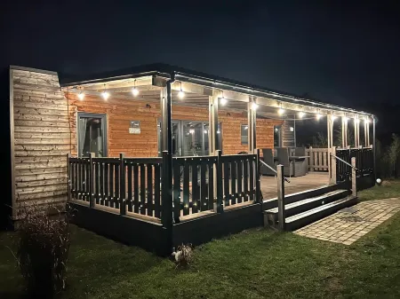 Great vacation home Rybak with box spring beds and large covered terrace