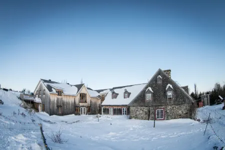 Auberge Le P'tit Bonheur Отели в г. Л'Иль-д'Орлеан