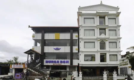 Treebo Durga Boji Grand, Gonikoppal Town Отели в г. Беттакери