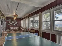 Amazing, sleeps 26, covered lakeside, bar, beach, Big St Germain Lake Hotels in St. Germain