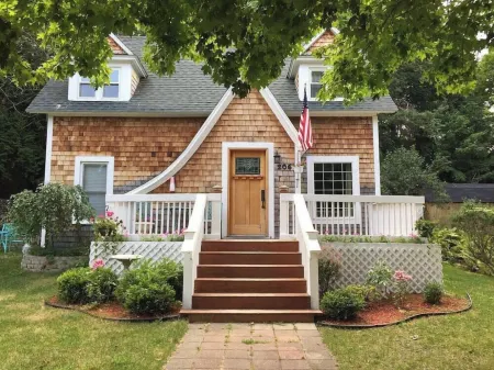The Boathouse on Waukazoo!  Beach, Bars, Brewery all within a block!