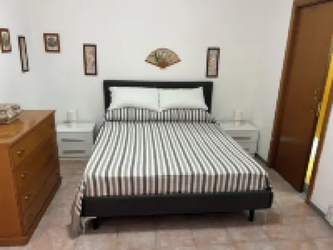 Vacation home with large outdoor space, 3 rooms, kitchen within walking distance to the sea Hotels in Costa Saracena - Castelluccio