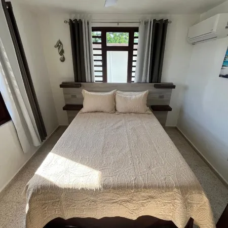 Charming 3-bedroom house with WiFi, AC in welcoming Rincón P.R. Отели в г. Ринкон