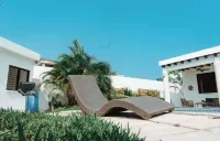 Tropical Exclusive Getaway ! Full  A-C Pool Jacuzzy Private Beach Relax & Unwind