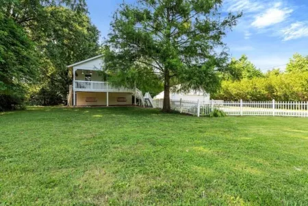 Beautiful Cottage on Large one Acre Private Lot