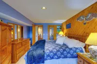 Sauna + Fireplaces! Lakefront Cadillac Retreat - 3-Star