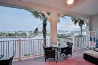 Elegant Waterfront Condo With Central AC, Balcony, and Shared Pools & hot Tubs