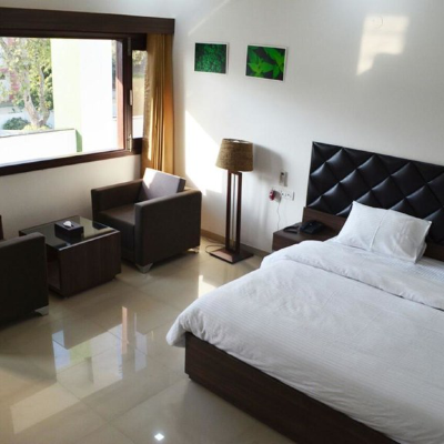 Hotel Whistling Greens Rooms