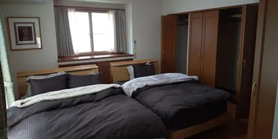 Minamiaso Guesthouse Hana Hotels in Мінаміасо