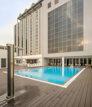 NH Coimbra Dona Ines Отели рядом с достопримечательностью «Baroque Library - University of Coimbra»