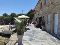 The apartment is located in front of Langosteira beach, with stunning views.