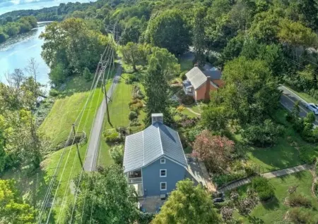 1818 Riverfront Cottage