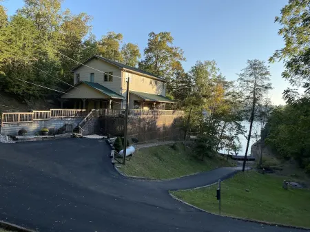 Douglas Lakefront home - dock, decks, firepit perfect for multi-family getaway!