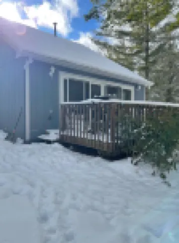 Snowmobile Cabin with Private Hot Tub & Panoramic Lake Views