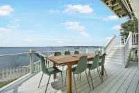 6BR Houghton Lake House w/ Indoor Pool, Hot Tub, and Golf Simulator - Sleeps 24