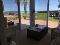 Charming and Cozy Lake Front Cottage on Private Beach Hotels in Huron County