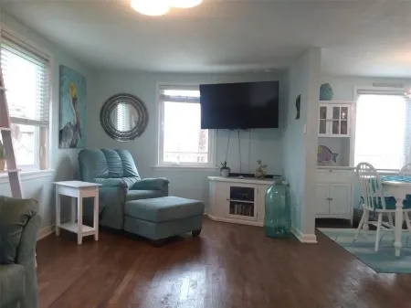 Beach and river view cottage with deck and specatuclar views.