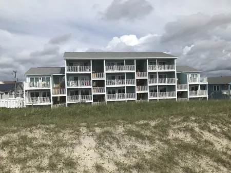 CORAL SURF C-1 CONDO OCEANFRONT WITH 2 BR AND 2 BTH.  PRIVATE 240V EV CHARGER