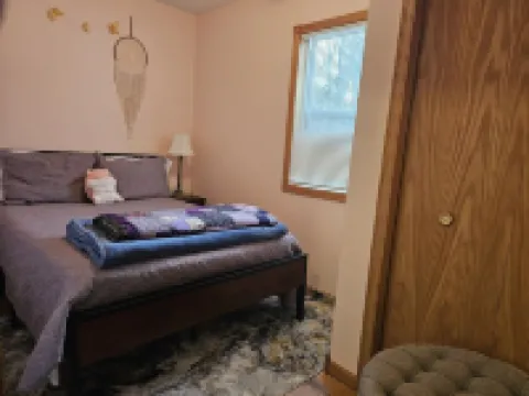 Relax in 3 bed, 2 bath house on quiet 2 acres with private lake.