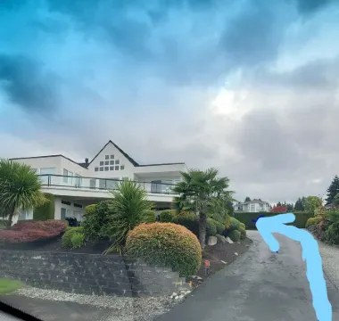 Relaxing in an Entire 5,400sf Beach View Home With Indoor Heated Swimming Pool.