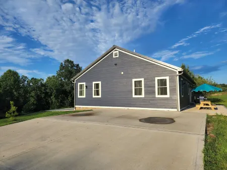 New! Custom built private home on a pond, with large hottub.