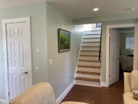Single family home with screened porch.