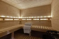 Private lakeside retreat with pool, hot tub, and sauna