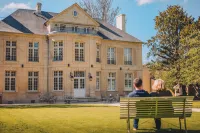 Domaine de Coeurmandie - Hôtel Château Hotels in Le Fresne-Camilly