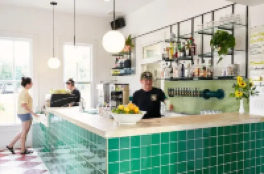 Private Parking and Sunny Front Porch - Charming Cottage Oasis