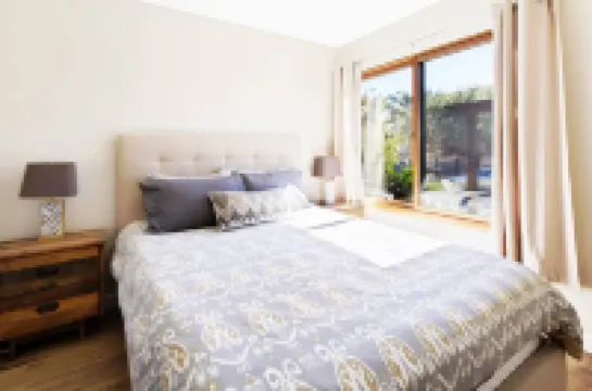 Modern Style with Enclosed Yard and Amenities - Charming Beachside Escape