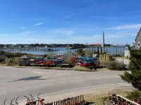 Harbor and Lighthouse Views with Spacious Porch - Charming Coastal Haven
