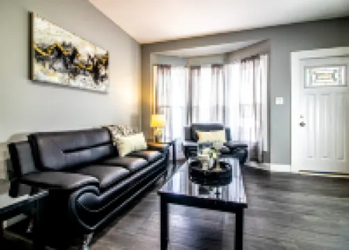 Modern Kitchen and Spacious Living Area - Inviting Downtown Escape