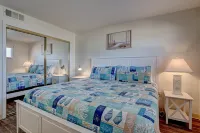 Oceanfront Escape with Pool and Arcade - Cozy Coastal Paradise
