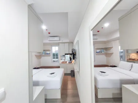 Warm and Cozy Style Studio Room at Paltrow City Apartment