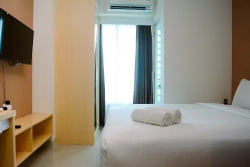 Minimalist and Homey 1Br Grand Kamala Lagoon Apartment