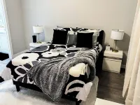 Modern 2-bed, 2-bath home with WiFi, Smart TVs, coffee, tea, and cereal included