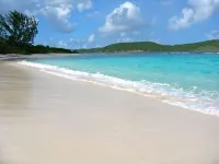 Beautifully newly renovated 3 BR/4 BA condo footsteps from the beach.