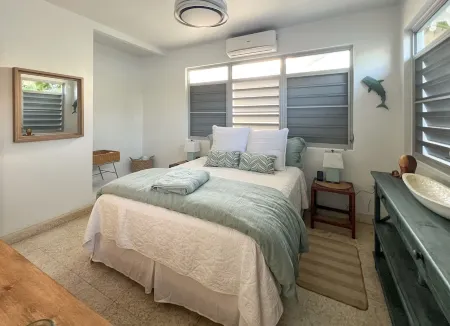 Stunning waterfront, art deco family compound cascading to the water’s edge