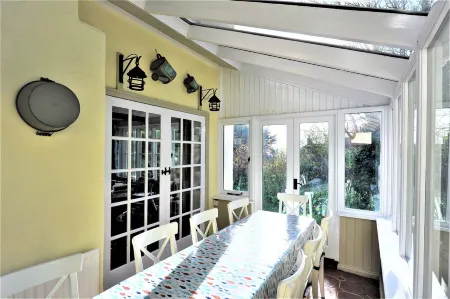 Shepherds Patch Is A Large Thatched Cottage In Thurlestone with a parking space.