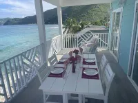 Spectacularly situated Beach Front  High Tide@ The Tides  at Little Apple Bay. Hotels in Tortola