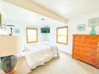 The Waves of Grace beach house! 2 MIN WALK TO BEACH! SANDY BOTTOM!