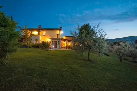 Old farmhouse surrounded by olive groves and near the village, max 9 adults, with pool