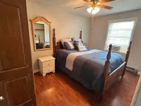 Spacious five-bedroom home off Back Lake with direct trail access on Spooner Rd