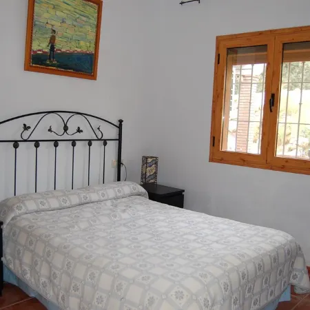 3 bed villa surrounded with tropical gardens with private pool 2 km from town.
