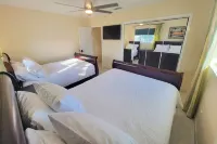 Canalfront Retreat! 2BR + Bunk Nook, Pool & Boat Dock – Easy Water Access!