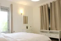 Luxurious 1BR Apartment in Palm Gate New Cairo Near AUC Hotels in El Matareya