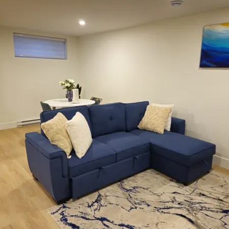 Fully furnished 1-bed basement apt in Moncton, fits 3 adults. Modern & cozy