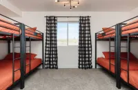 Spacious 8-bedroom house in The Reserve with lake access, pool, and courts.