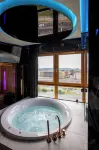 Glass House Hot Tub Apartments